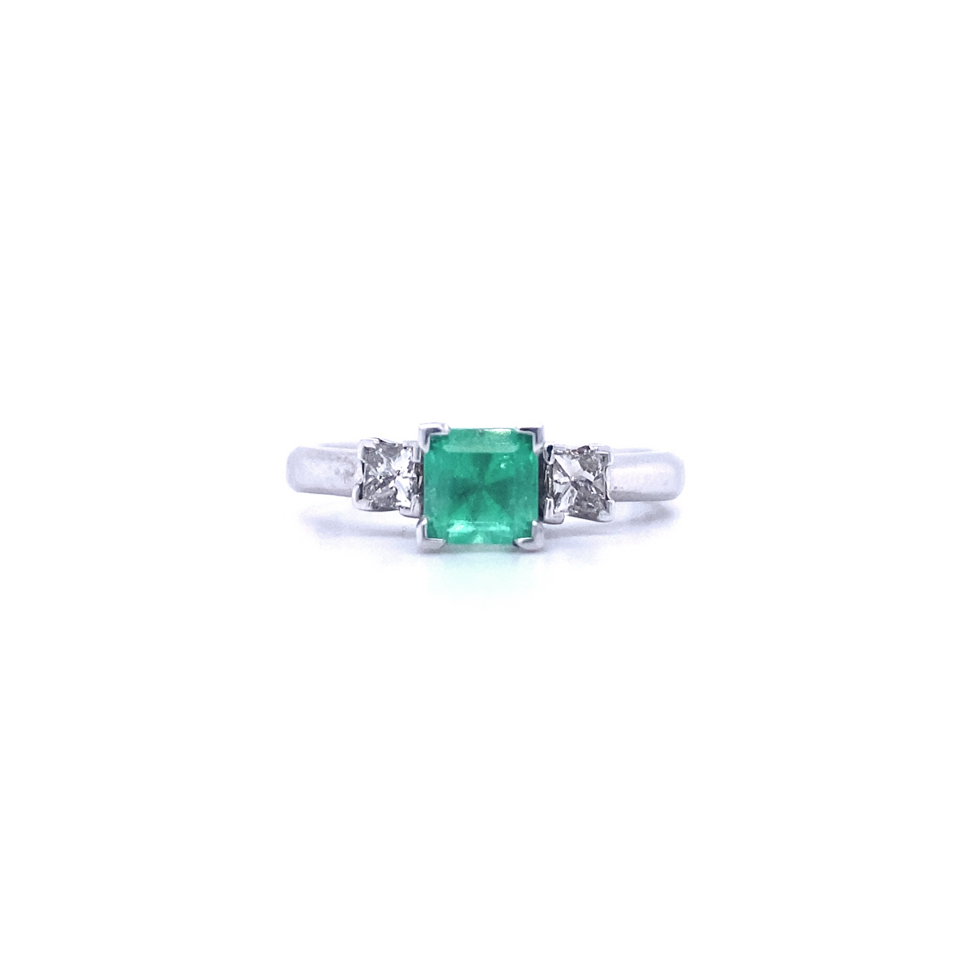 14 Karat White Gold Emerald and Diamond Three Stone Ring