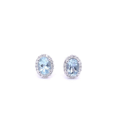 14 Karat White Gold Blue Topaz and Diamond Halo Oval Stud Earrings
