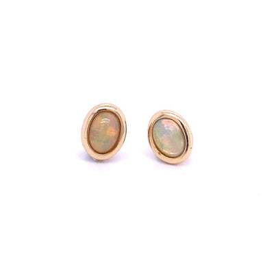 14 Karat Yellow Gold Opal Small Oval Stud Earrings